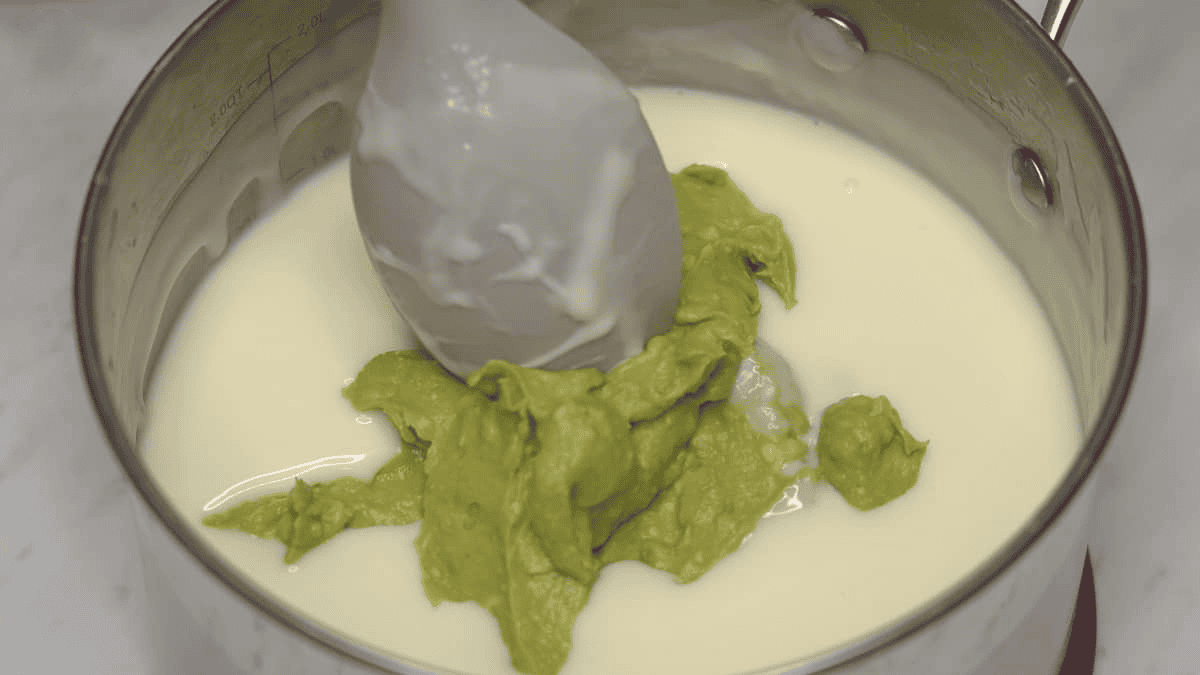 Added the blended avocados tot he cream mixture in the saucepan.