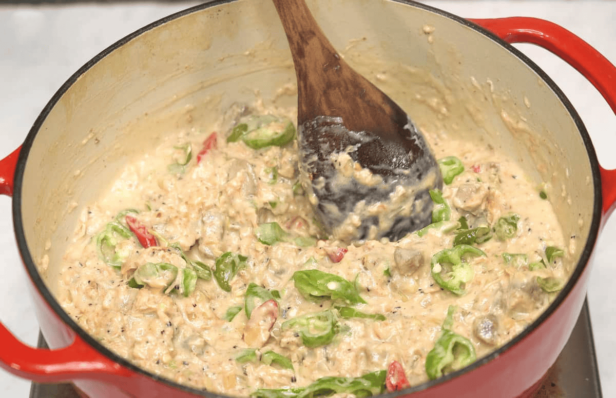 Mixing the cooked Bicol Express.