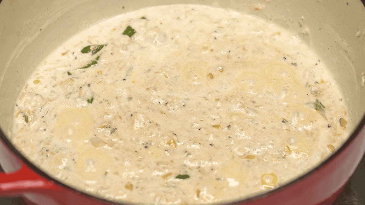 Shrimp paste and coconut milk in the pot.