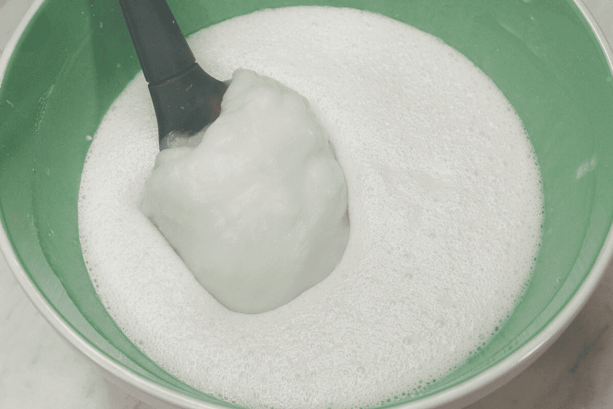 Adding the tangzhong to the batter in the bowl.