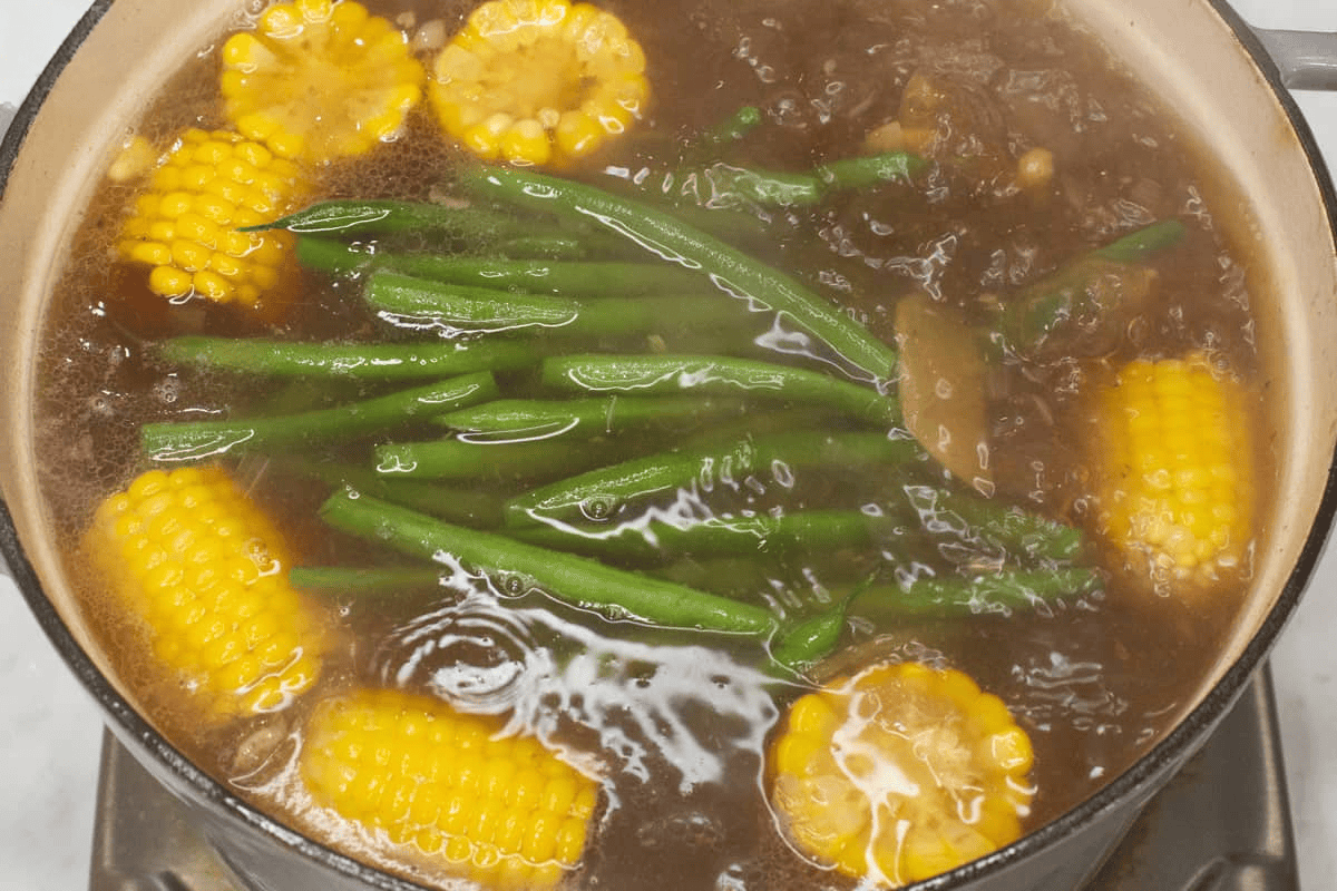 Added the green beans to the pot.