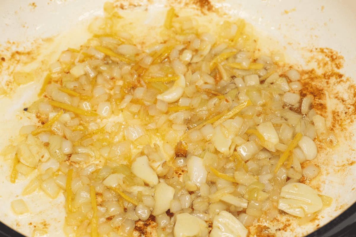 Sauteing the aromatics in the saute pan.