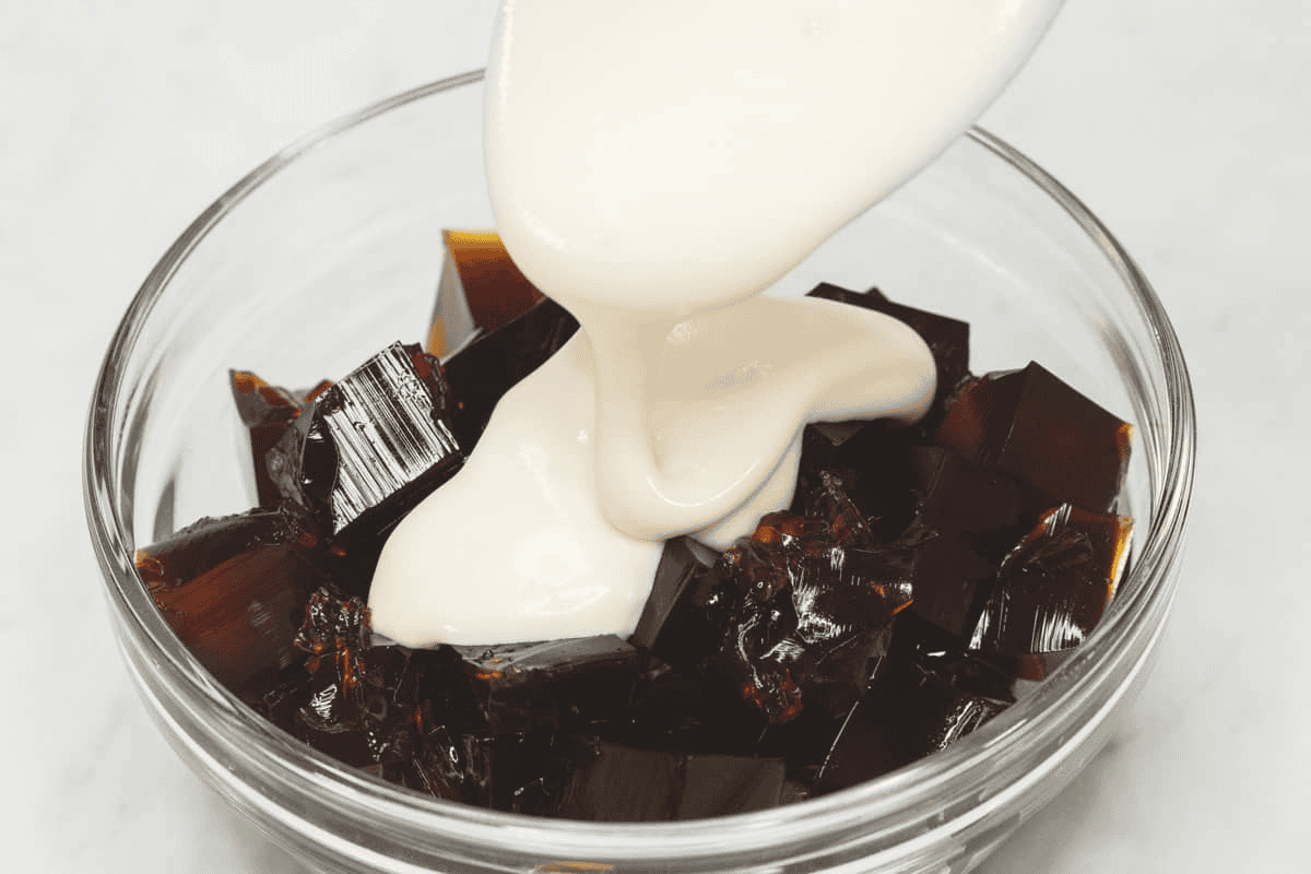 Assembling the Coffee Jelly in a bowl.