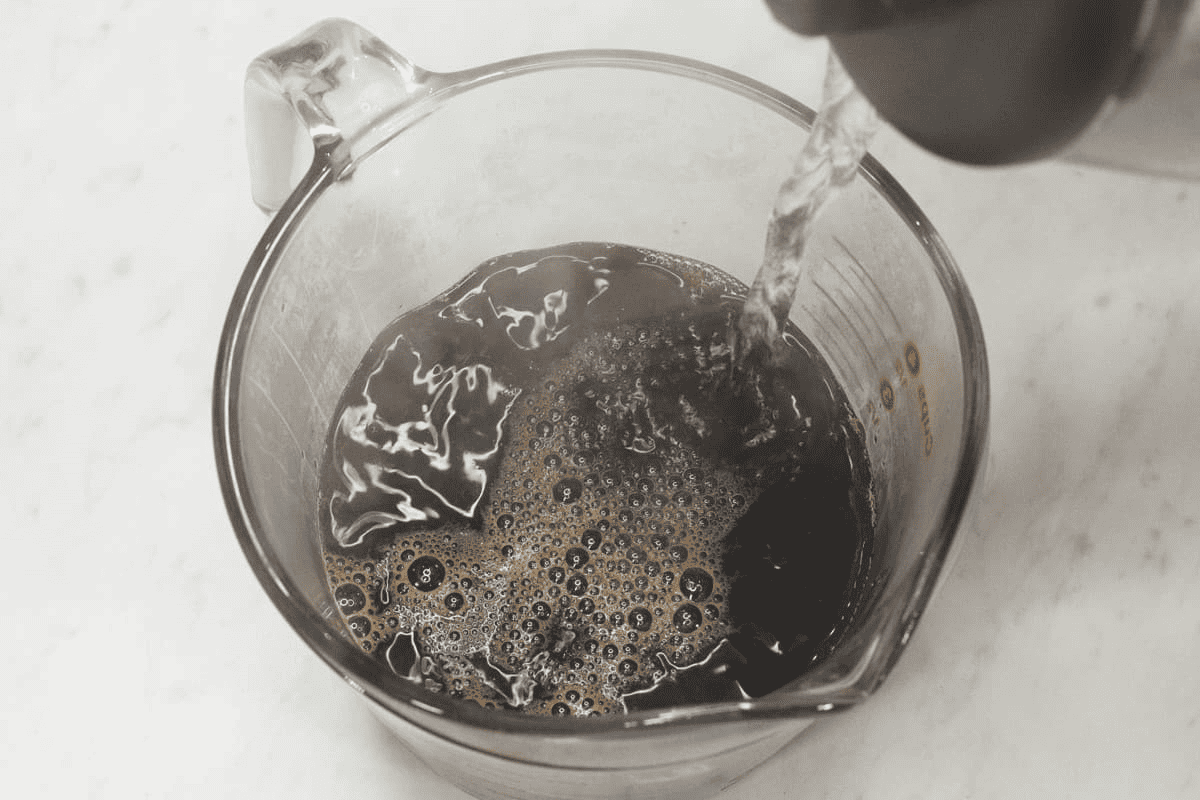 Making the coffee in a cup.
