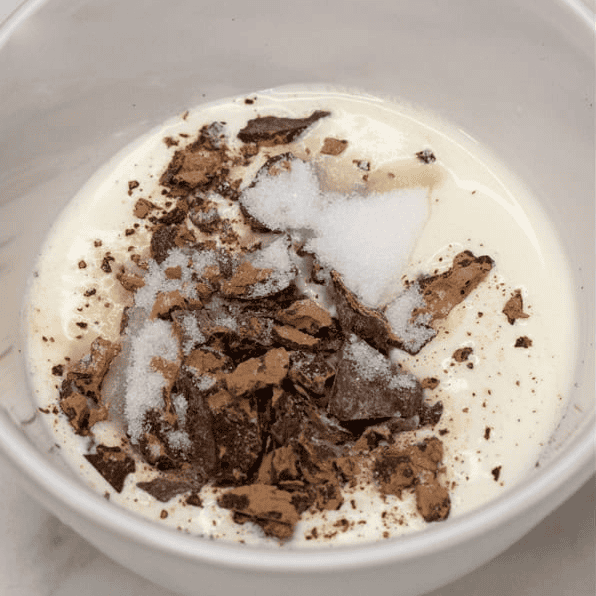 Ingredients for the chocolate dipping sauce in a bowl.