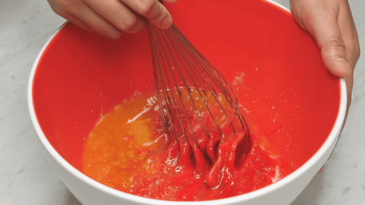 Mixing the wet ingredients.