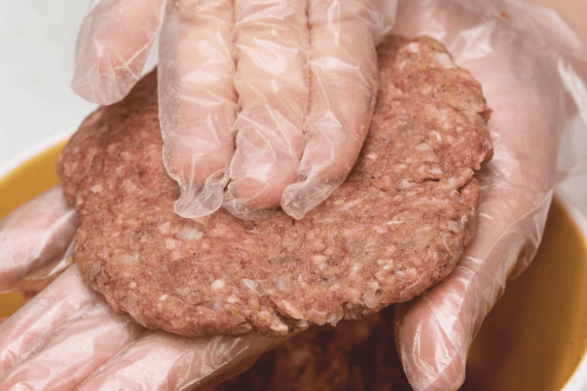 Forming the patties with the palms of the hands.