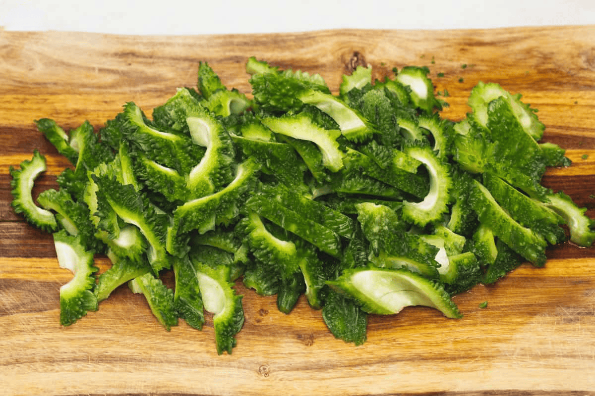 Sliced ampalaya on a cutting board.