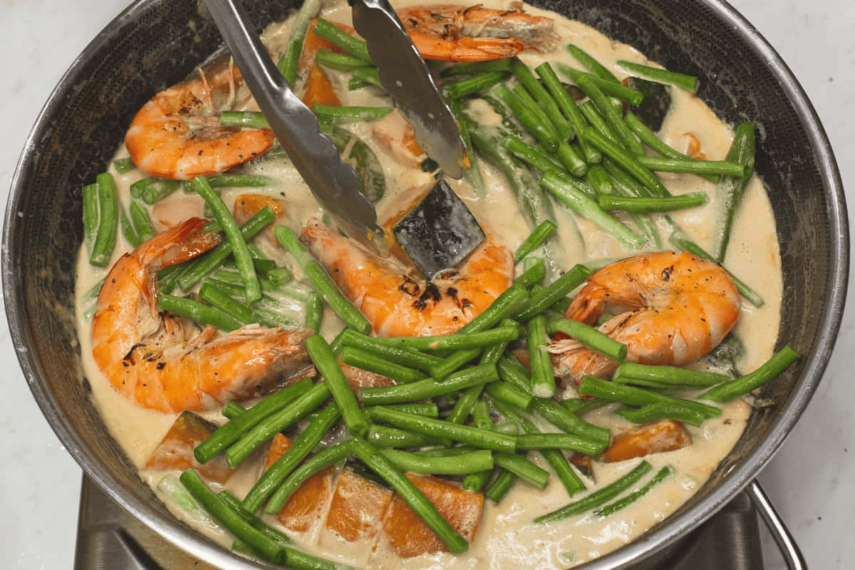 Added the sitaw and shrimp into the wok.