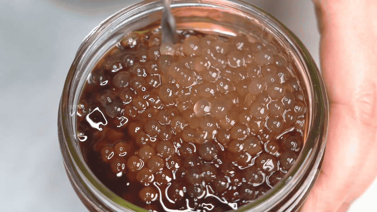 Sago in brown sugar syrup.