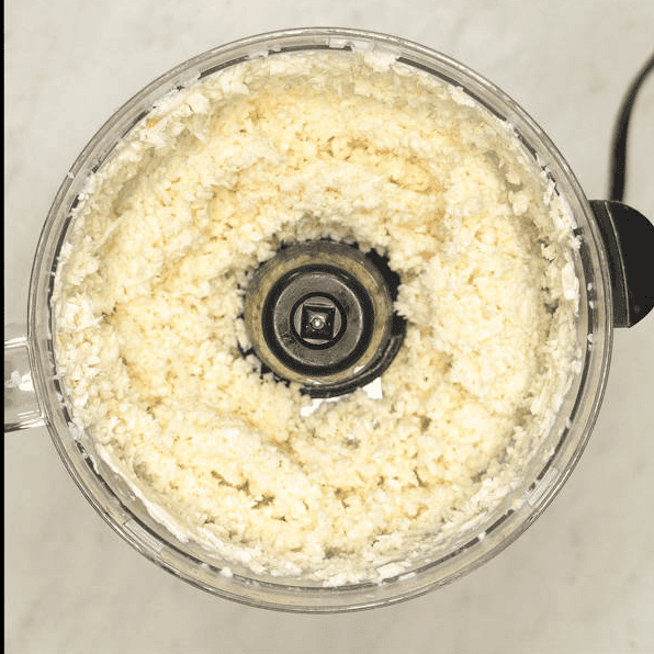 Finely processed cassava in a food processor.