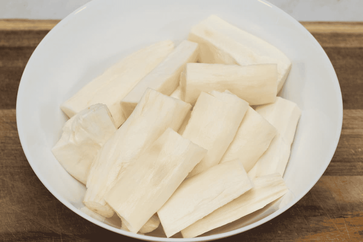 Rinsed cassava pieces in a bowl.