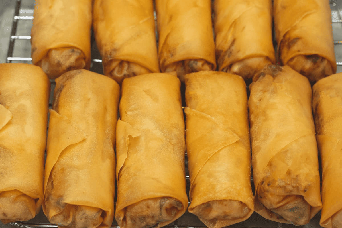 Fried Lumpiang Labong on a wire rack.