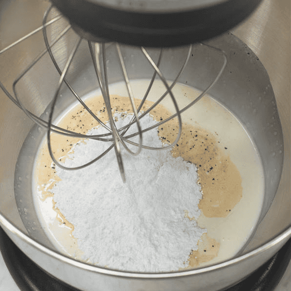 Cream, powdered sugar, and vanilla in the mixer bowl.