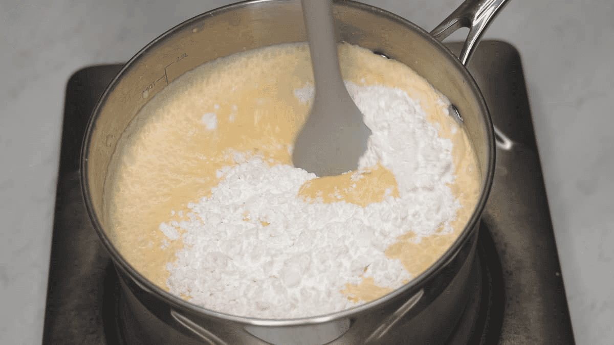 Dissolving tapioca starch in the ice cream mixture.