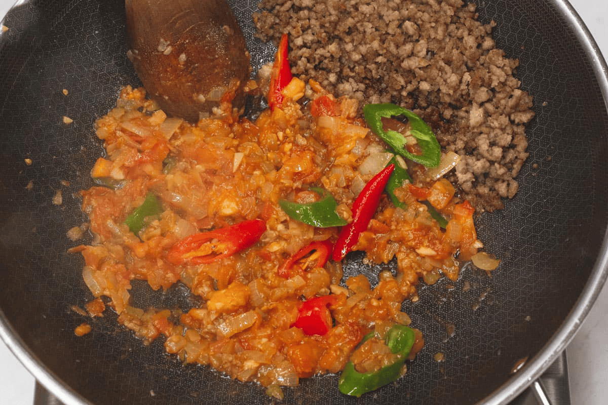 Sauteing aromatics in the wok.