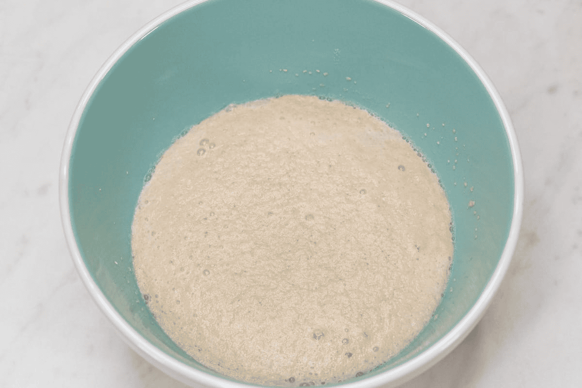 Activating the yeast in a bowl.
