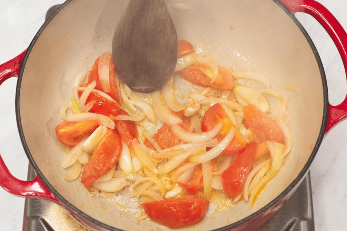 Sauteing aromatics in the pot.