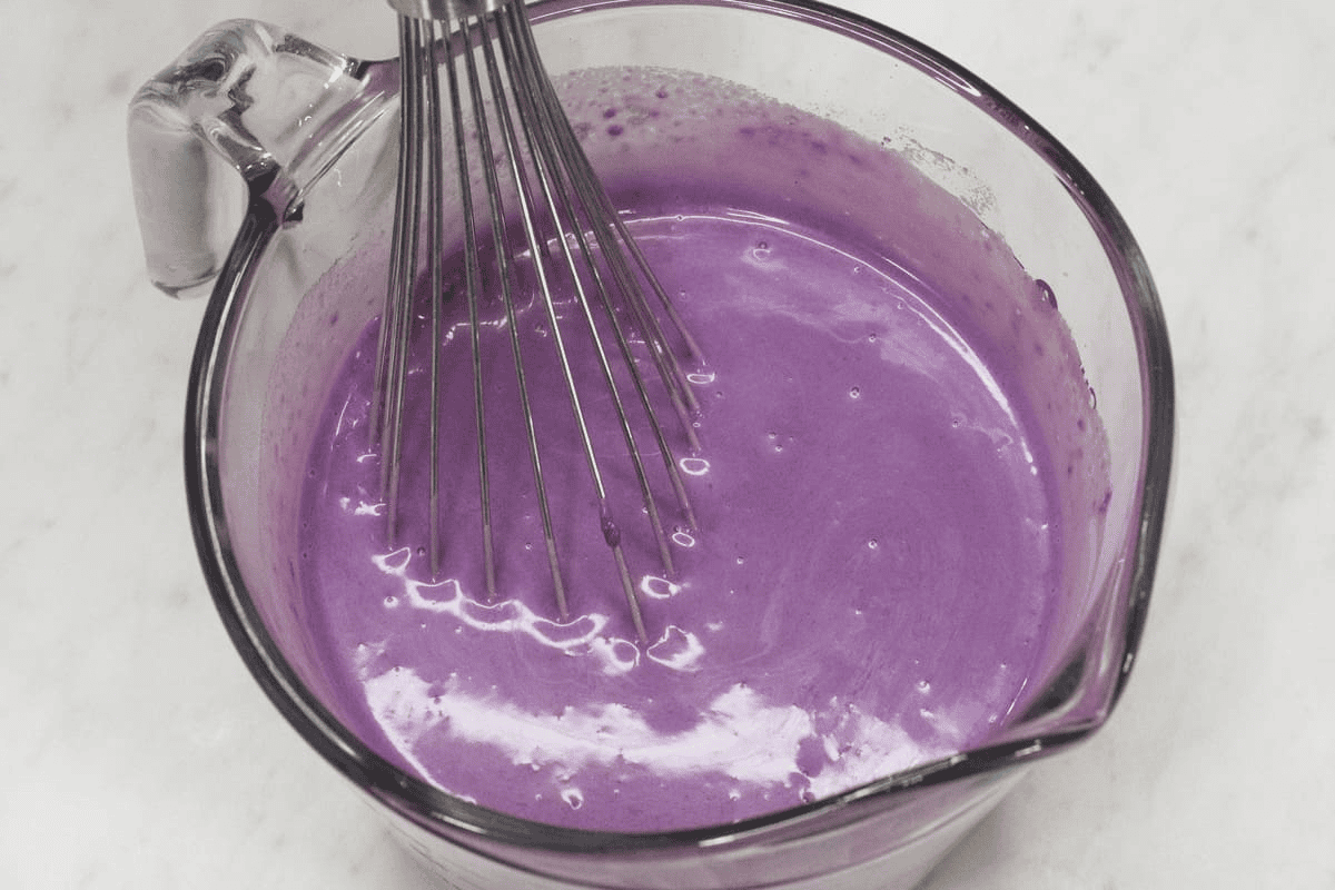 Mixing the ingredients in a bowl.
