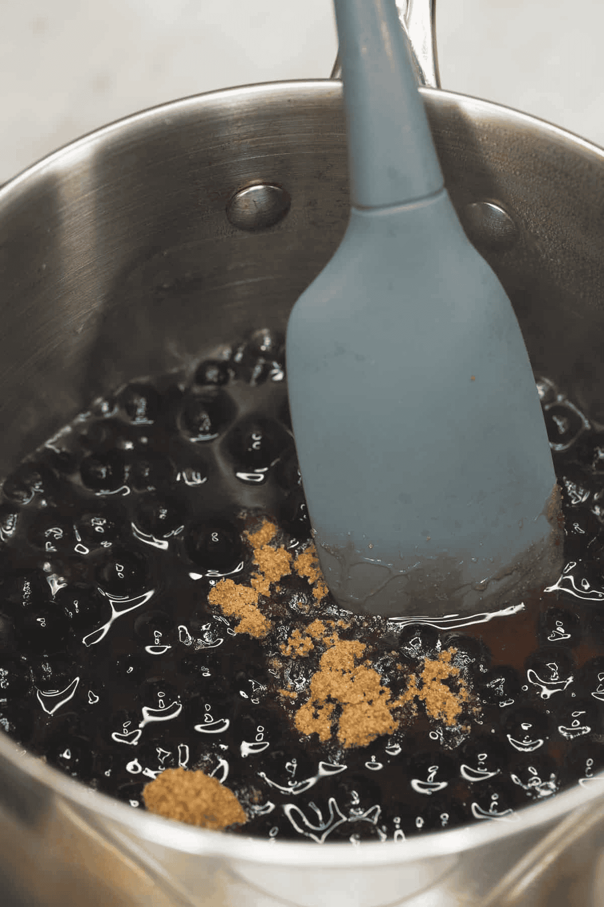 Tapioca pearls and brown sugar in a saucepan.
