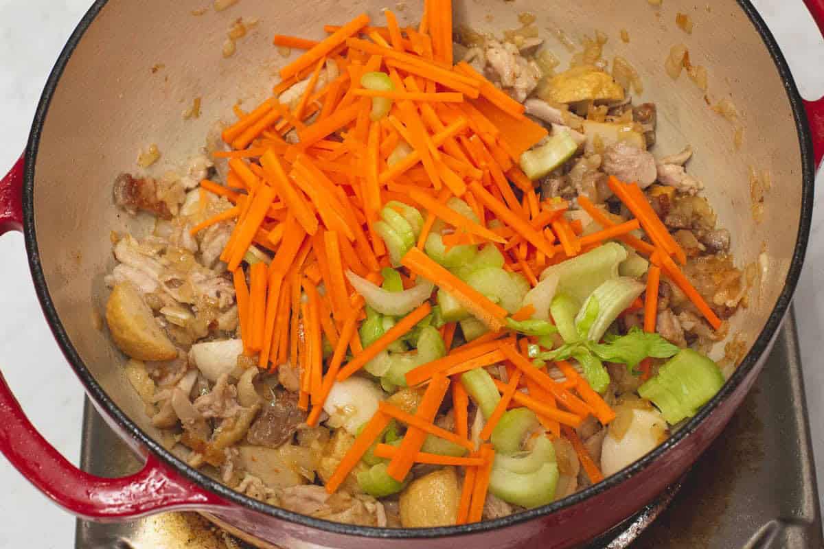 Added the carrots and celery into the pot.