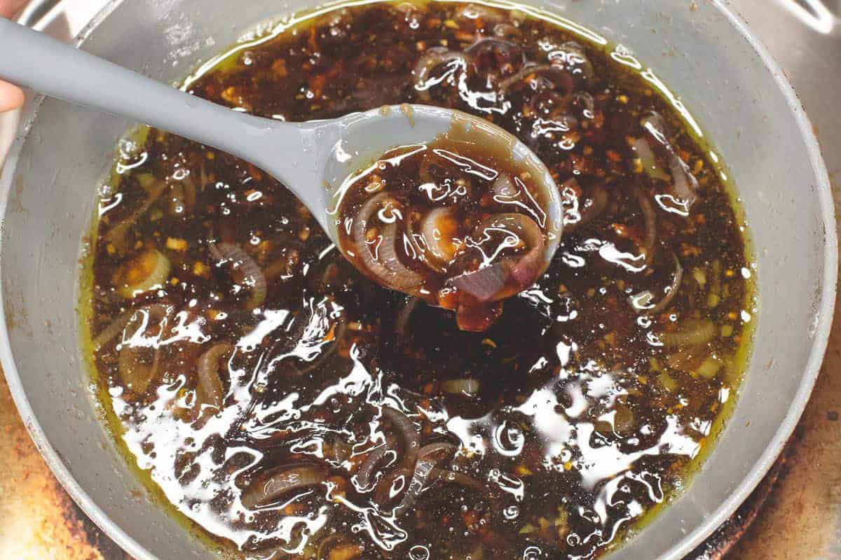 Making the sauce for Bangus a la Pobre.