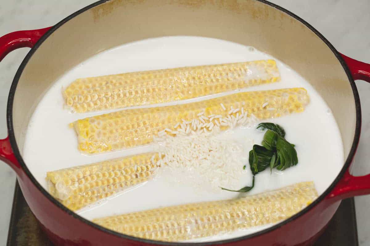 Combining the ingredients in a Dutch oven.