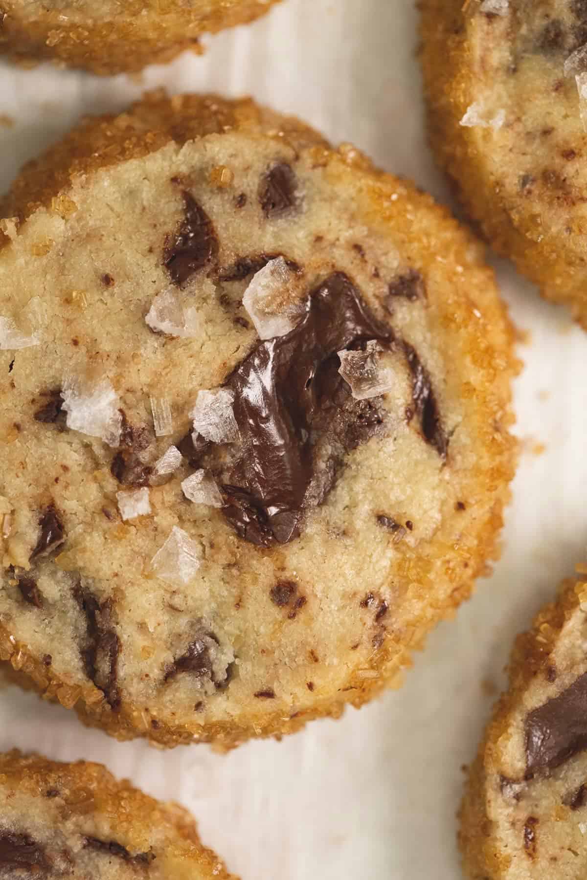 Baked Salted Chocolate Chunk Shortbread Cookie with flaky salt on top.