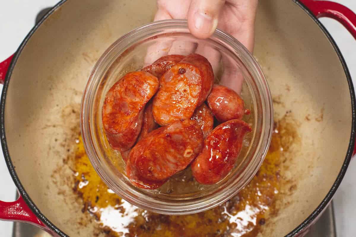 Seared chorizo in a bowl.