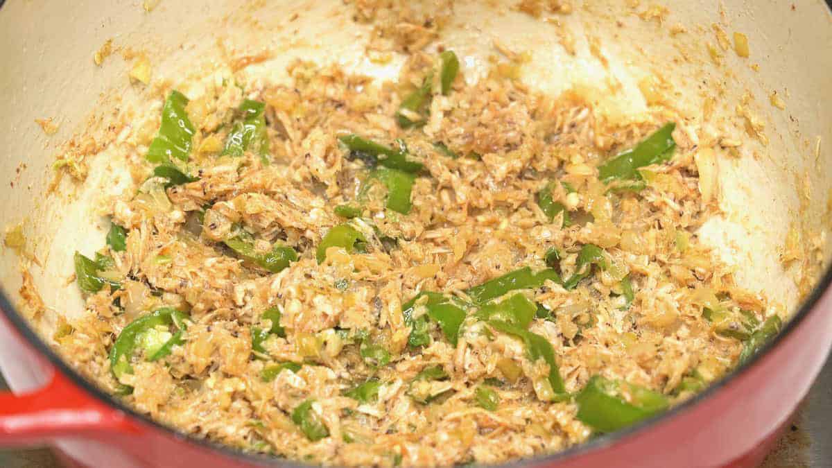 Sauteed shrimp paste and chilies in the pot.
