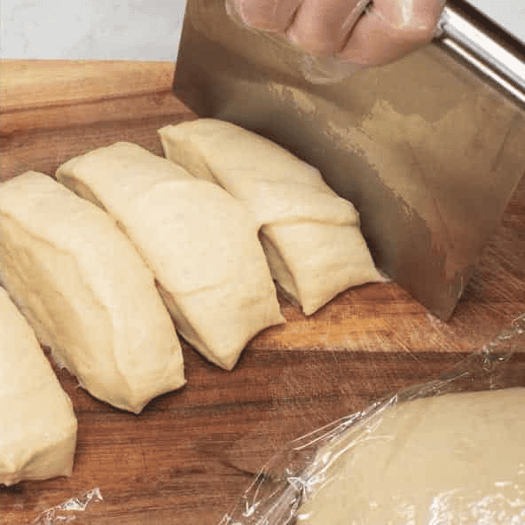 Cutting the dough into portions.